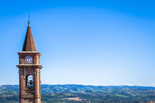Piedmont Hills In Italy With Scenic Countryside, Vineyard Field And Blue Sky. Govone Bell Tower On The Left.