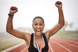 © Nicholas Felix/peopleimages.com - Fierce in the face of adversity. Shot of a beautiful young female athlete celebrating at the end of her race.