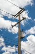 © pla2na - Electric pole transmission power line with blue sky background. Electrical energy and technology concept.
