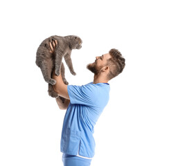 Wall Mural - Male veterinarian with Scottish fold cat on white background