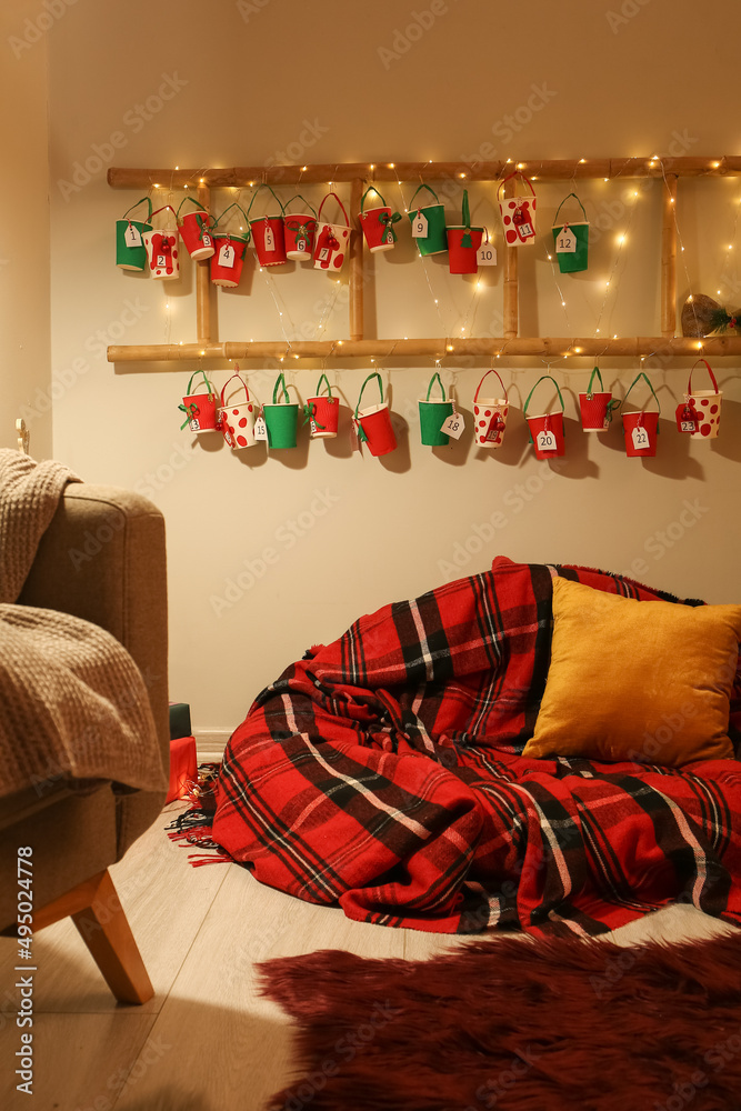Advent calendar hanging on wall in room