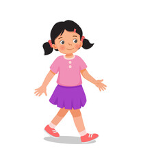 cute little girl walking on the road