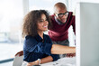 © Lyndon Stratford/peopleimages.com - This one, right here. Cropped shot of a male supervisor helping an attractive young businesswoman while working in their office.