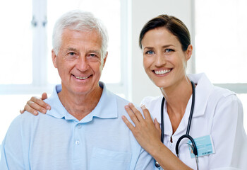 Canvas Print - Hes safe in her hands. Portrait of a beautiful young doctor and her senior patient.