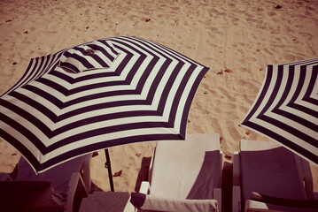 Wall Mural - Beach chairs with umbrella on beautiful tropical Samui island, Thailand. Travel summer beach holiday concept.