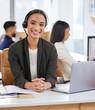 © Lumeez I/peopleimages.com - Strengthen your brand by developing a good relationship with customers. Portrait of a young businesswoman working on a laptop in a call centre.