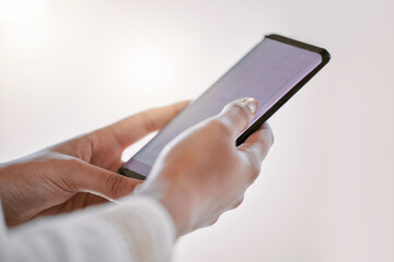Aufkleber - Lets communicate. High angle shot of an unrecognizable businesswoman sending a text message while in the office.