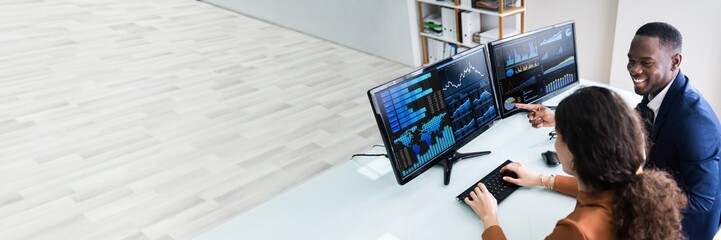 Poster - Two Businesspeople Examining Graph On Computer
