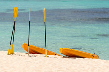  Orange Boats With Oars On The Sandy Shore. Beautiful Seascape On The Caribbean Sea In The Dominican Republic