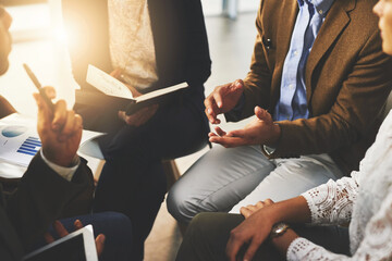 Poster - Debate skills are important in selling a product. Cropped shot of a group of unrecognizable businesspeople sitting in a meeting.