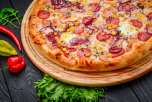 Pizza With Quail Eggs, Ham, Sausage And Vegetables
