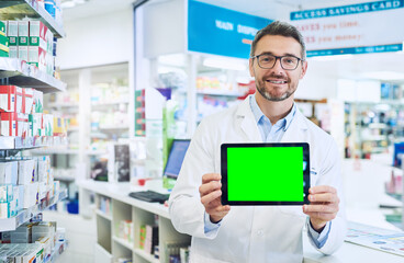 Poster - Too ashamed to explain your symptomsYou can do that online. Shot of a pharmacist holding up a tablet with a chromakey screen.