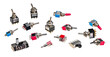 Different types of electrical toggle switches isolated on a white background. Collection of miniature electromechanical electronic components with metal on-off lever for use on printed circuit boards.
