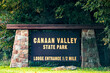 Sign on road for canaan valley ski resort and conference center in state park in Davis, West Virginia at colorful autumn fall season