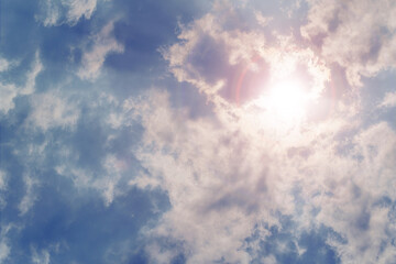 Wall Mural - sun shining through rain clouds