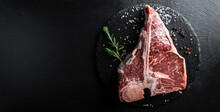 The T-bone Or Porterhouse Steak Of Beef Cut From The Short Loin. Steak Include T-shaped Bone With Meat On Each Side. Porterhouse Steaks Are Cut From The Rear End Of The Short Loin