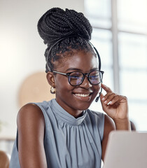 Fototapete - Thank you for calling our customer care line. Shot of a young woman using a headset in a modern office.