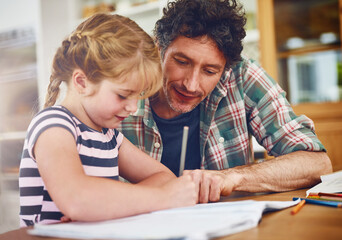 Poster - Dads always around to lend a hand with homework. Cropped shot of a father helping his daughter with her homework.