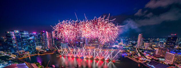 Wall Mural - Banner image of fireworks with Singapore city view at night.