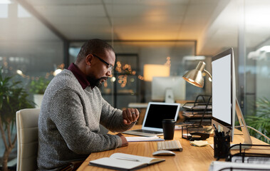 Poster - i didnt notice the time. cropped shot of a handsome mature businessman sitting at his office desk an