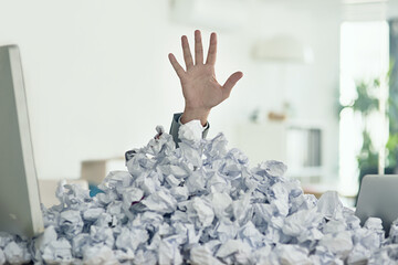 Poster - Theres a light at the end of the admin tunnel. Shot of an unidentifiable businessman drowning under a pile of paperwork in the office.