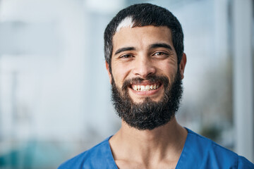 Poster - It takes courage and compassion to enter this profession. Portrait of a medical practitioner standing in a hospital.