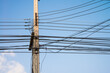 © pla2na - Electric pole transmission power line with blue sky background. Electrical energy and technology concept.