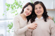 © Timeimage - Image of Asian mother and daughter at home