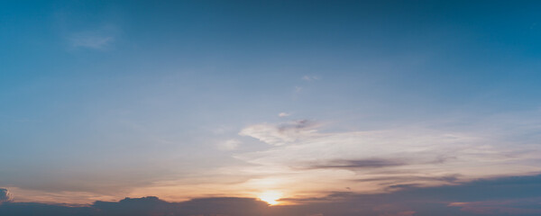 Wall Mural - clouds over the sky sunset background.