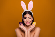 Closeup Photo Of Asian Ethnicity Pretty Girl Wear Easter Fluffy Ears Hold Painted Eggs Prepare Dinner Isolated Pastel Background