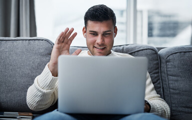Poster - Catching up from the safety and comfort of home. Shot of a young man using a laptop to make a video call while working from home.
