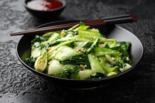 Chinese Fried Pak Choi With Garlic, Sesame Seeds. Healthy Food