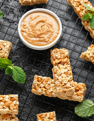 Wall Mural - Roasted Peanuts butter Cereal Bars with nuts, oat and honey. Healthy Protein snack