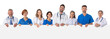 © alotofpeople - Medical team holding blank billboard