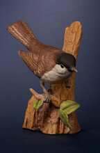 Ceramic Figurine Of A House Sparrow Sitting On A Branch