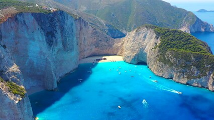 Wall Mural - Navagio beach, Zakynthos Island, Greece. Aerial landscape. Rocks and sea from the drone. Summer landscape from the air.