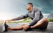 © Angelo J/peopleimages.com - Your muscles need to wake up first. Shot of a sporty young man exercising outdoors.