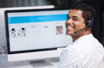 Wall Mural - you can reach us through multiple channels online too. portrait of a young businessman working on a 