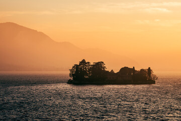 Wall Mural - sunset on the island on the lake