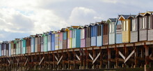 Beach Huts On A Cloudy Day
