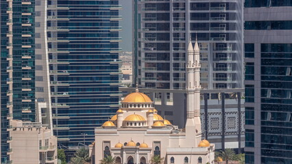 Wall Mural - Dubai Marina skyline with Mohammad Bin Ahmed Al Mulla mosque aerial timelapse