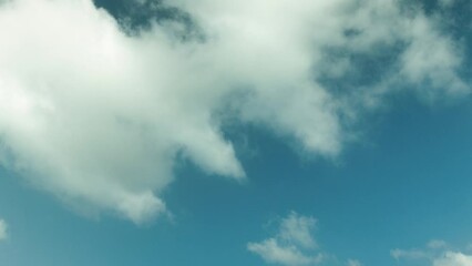Wall Mural - Time-lapse of Clouds Moving Fast in the Blue Sky