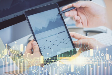Poster - Multi exposure of man's hands holding and using a digital device and data theme drawing. Innovation concept.