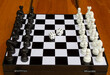 Chessboard and dice. The concept of uncertainty, planning, strategy. Uncertainty and confidence in action.