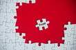 © Maurice Yom - Trust text on missing jigsaw puzzle. Conceptual