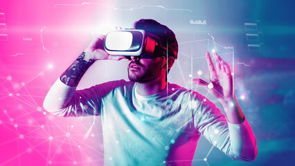 Young guy in virtual reality glasses, having fascinating virtual reality experience, double exposure creative image