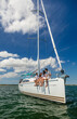 © Spotmatik - Latino family enjoying healthy outdoor vacation on yacht