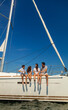 © Spotmatik - Latino family on luxury yacht enjoying Summer vacation