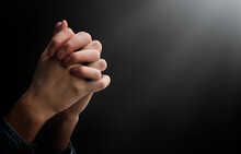 Praying Hands In The Dark