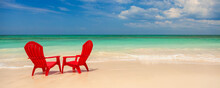 Panoramic Red Travel Chairs On White Sandy Beach
